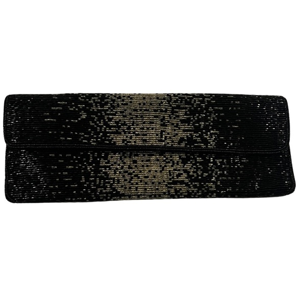 BCBGMaxAzria Handbags - BCBG MAXAZRIA Vintage Fold Over Clutch Embroidered and hand-sequined